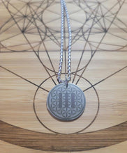 Load image into Gallery viewer, Sacred geometry pendant tuned to 111Hz for calm, relaxation, and harmony.